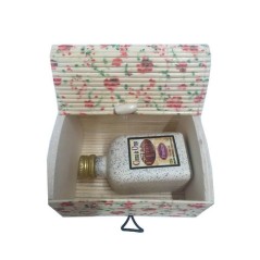 Liquor of cream of orujo with miniature trunk for gifts in events