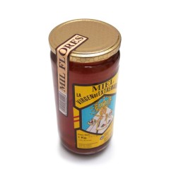 Pure milflores honey in 1 kg glass jar