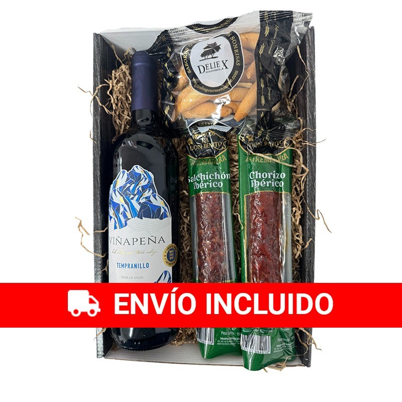 Cesta regalo con ibéricos, vino y picos
