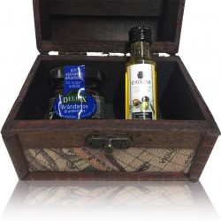 Little chest of dark wood decorated with map with little bottle of olive oil and the marmalade of blueberry