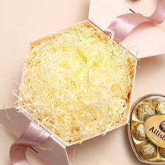 Cartón kraft desmenuzado color amarillo en forma de viruta |Regalos Gourmet Online