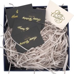 Shredded gray kraft cardboard in a shavings shape | Gourmet Gifts Onli